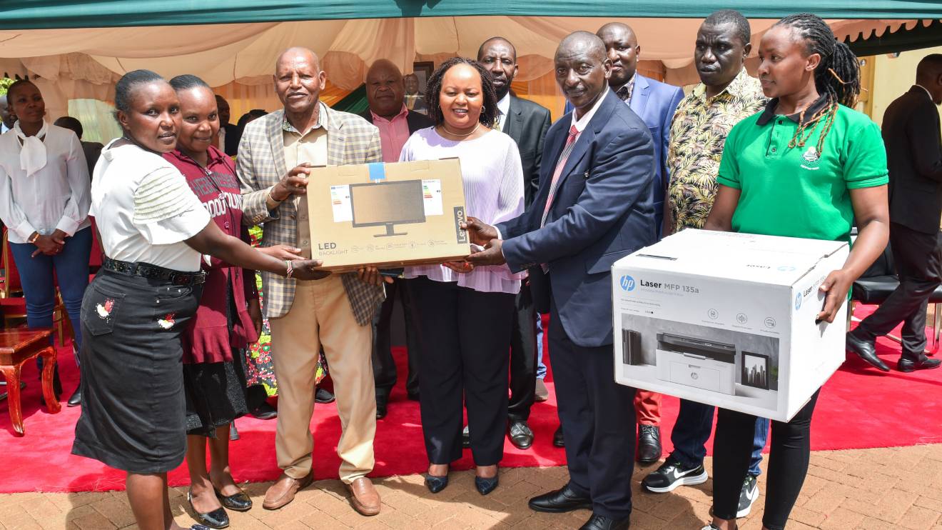 Anne Waiguru handing over items in Kirinyaga County. PHOTO/COURTESY